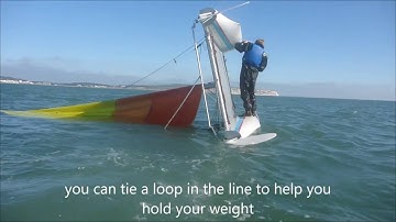 Righting an inverted catamaran