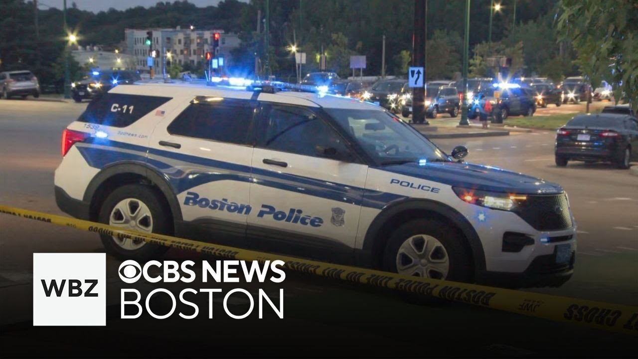 Boston police officer struck by car, suspect shot - YouTube
