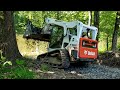 Finishing Private gravel boat ramp with 3" stone, Illinois land & Bobcat T650 CTL/MTL