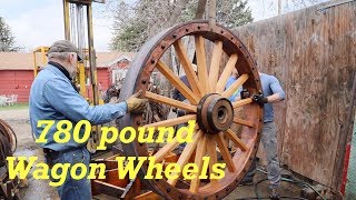 Hot Setting 450 pound Steel Tires on the Water Wagon Wheels | Engels Coach