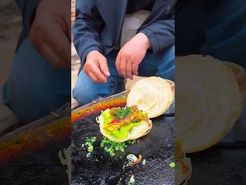 Chinese burger Grandpa and grandson cooperate in making food