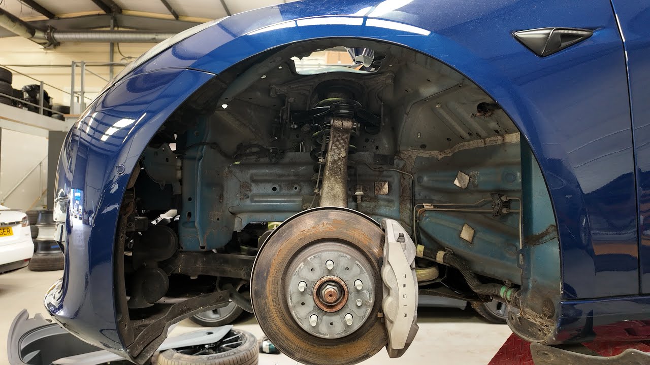 Replacing the upper control arms on a Tesla Model 3! 