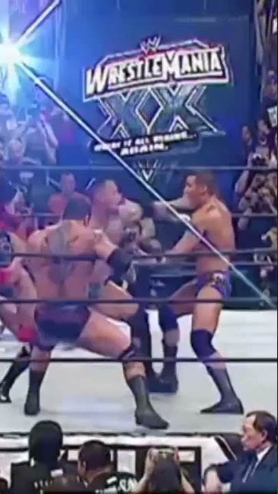 The Rock beating Batista &Randy orton..