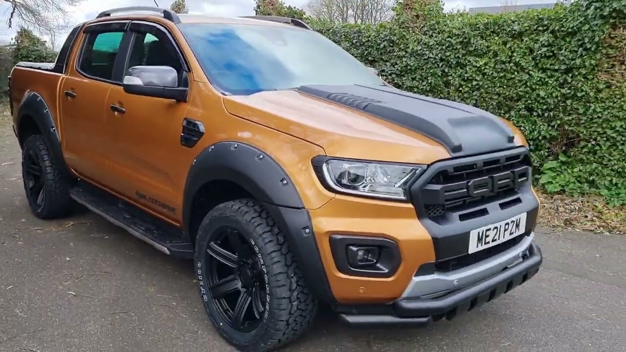 Ford Ranger Wildtrak Custom Design with power Roller Shutter. www.downsautos.co.uk