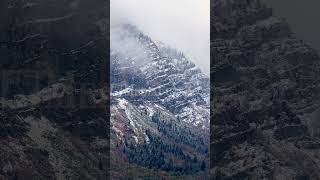 Stock Video - Vertical Timelapse clouds moving through the canyons on Cascade Mountain