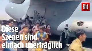 Flucht aus Kabul: Menschen klammern sich verzweifelt an Flugzeuge