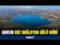 Türkiyənin Qars şəhərindəki gölün üzərini örtən buzlar əriyib