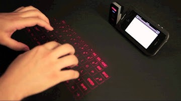 Celluon Prodigy Prototype - iPhone case with built-in battery pack and projection keyboard
