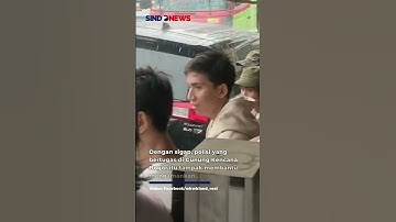 Momen Seorang Polisi di Bogor Nekat Hujan hujanan hingga Basah Kuyup demi Atur Lalu Lintas