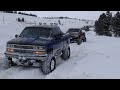 97 Chevy K1500 and 95 Chevy K2500 Snow Wheeling During A Snow Storm