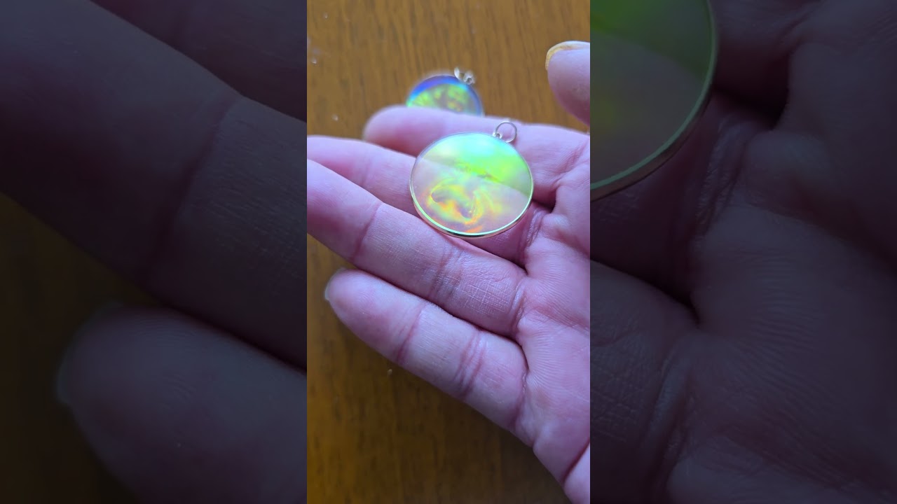 Hologram pin the door of heaven. Buddha and Albert Einstein