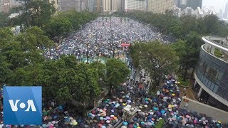 Tens of thousands pro-democracy protesters marched peacefully through
the streets hong kong on sunday, 11th weekend in a row anti-government
dem...