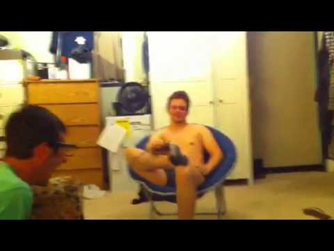 Guy uses a taser on himself then his friend