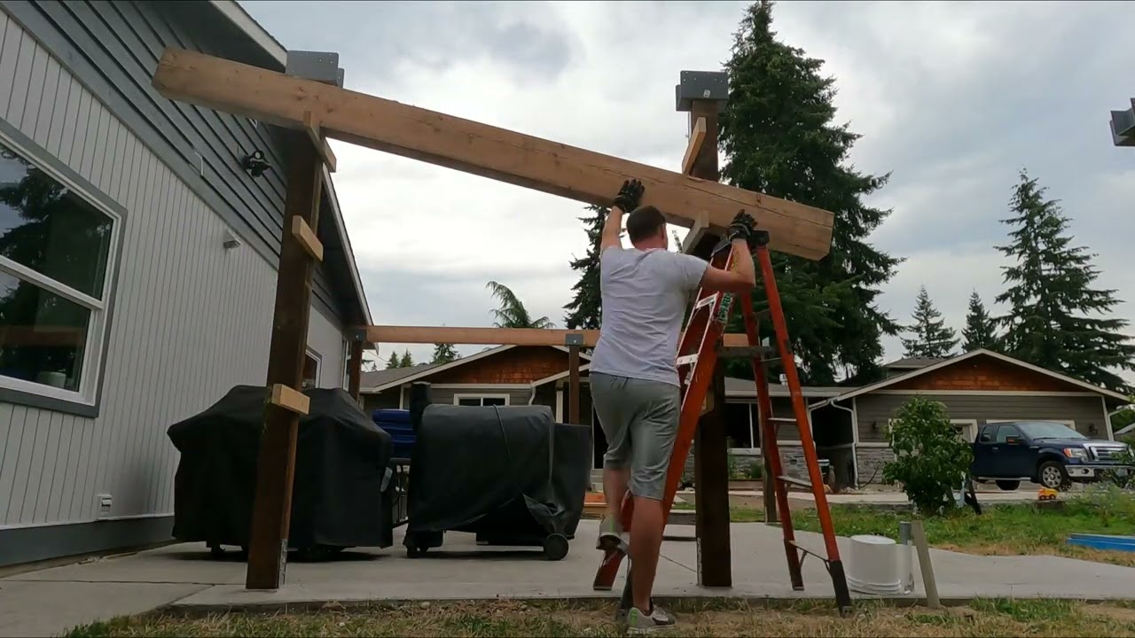 Lifting a heavey beam to set on a post