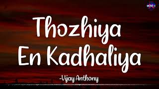 𝗧𝗵𝗼𝘇𝗵𝗶𝘆𝗮 𝗘𝗻 𝗞𝗮𝗱𝗵𝗮𝗹𝗶𝘆𝗮 (Lyrics) - Vijay Anthony | Harish x Charan /\ #ThozhiyaEnKadhaliya