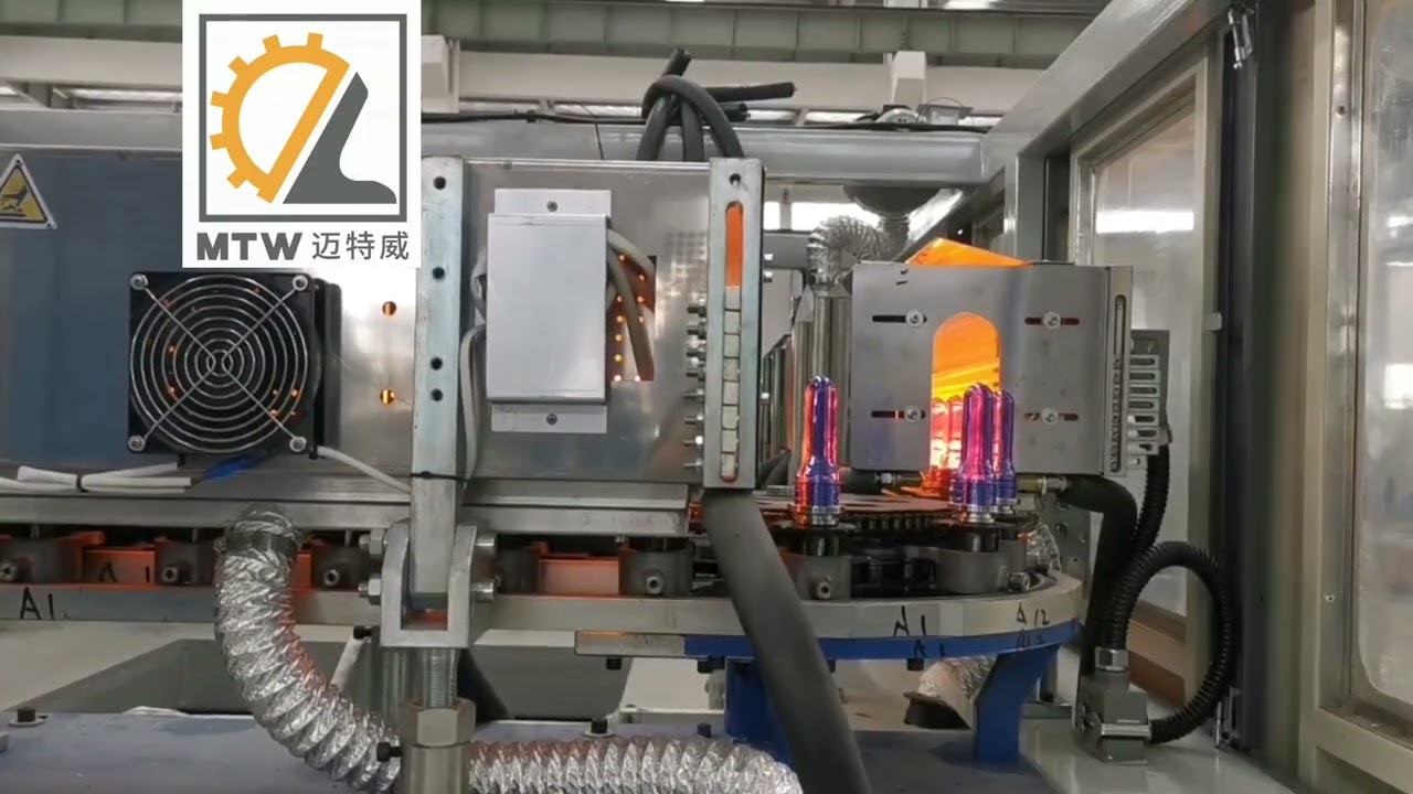 MTW   Bottle blowing machine, 1 input, 4 outputs, bottles are conveyed by air.