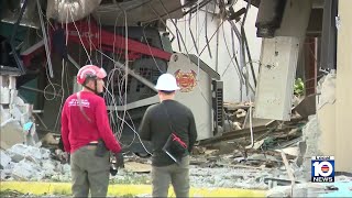 It's demolition day for a strip mall in Miami-Dade