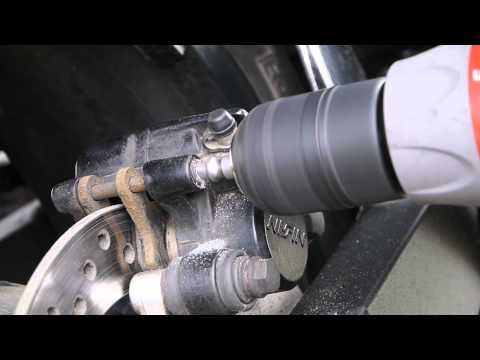 Removing a stuck caliper pin cover