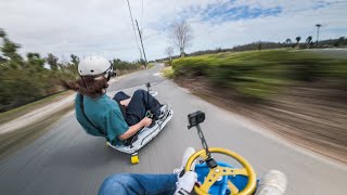 POV drifting little go karts in tandem