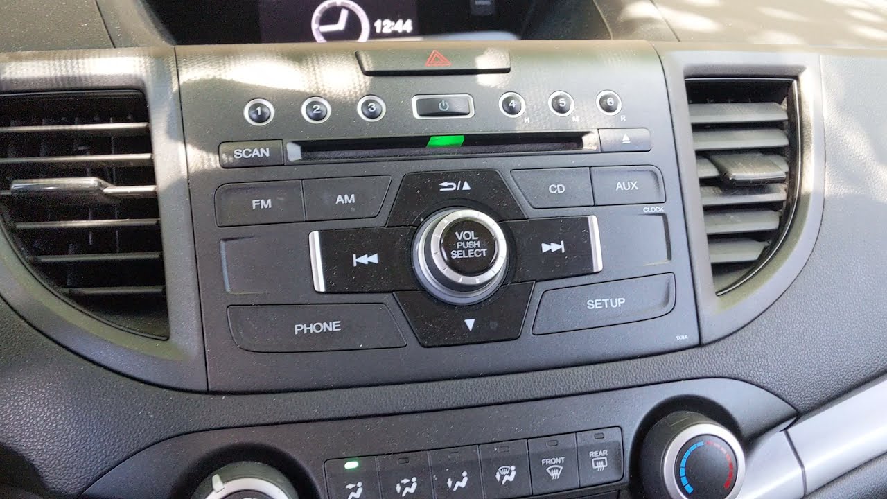 2012 Honda CR-V Buscas El Input (entrada) de USB y Auxiliar ? Como Ajustar  El reloj .Facil - YouTube