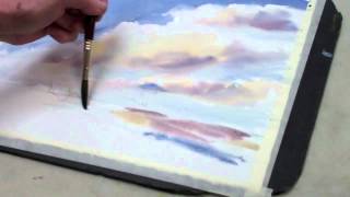 Artist susan herron demos a sky painting in watercolor during her
class for intermediate painters, "creative watercolor." (the artist's
website is at http://...