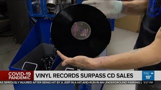 Vinyl record sales surpass CD sales for first time since 1980s