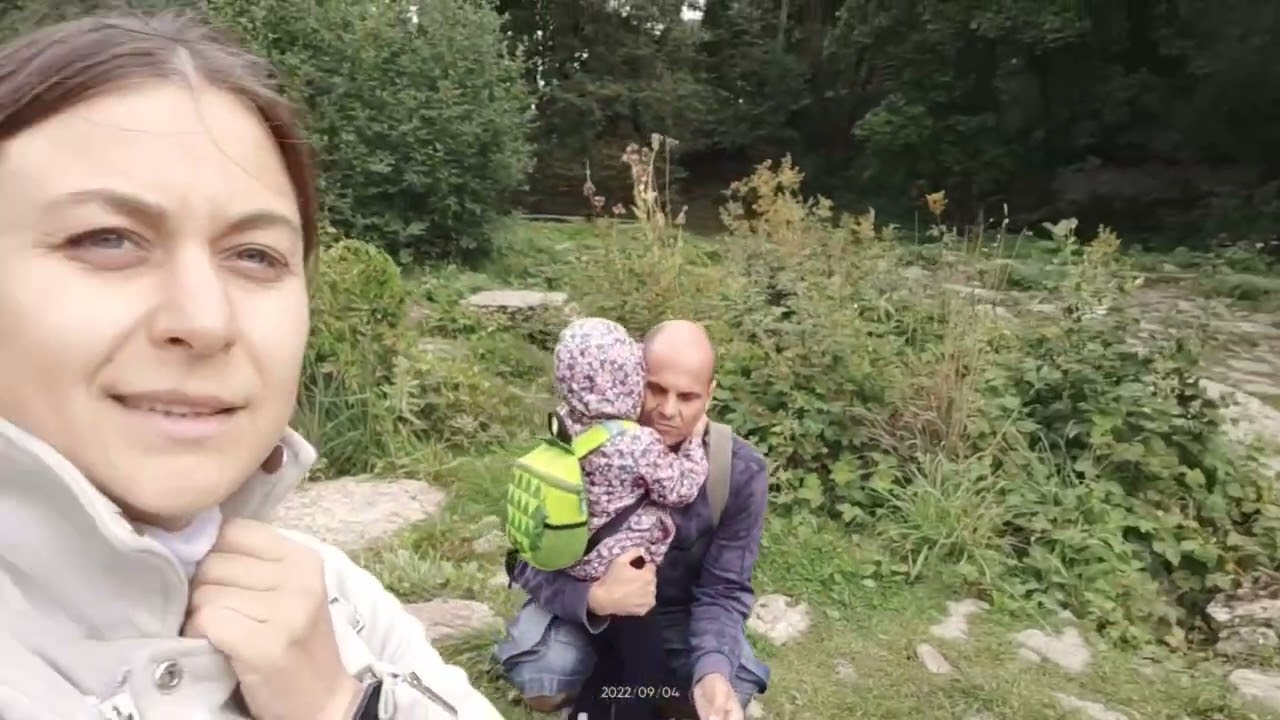 a trip to waterfall scary cliff, close at feet dangerous place carefully moved walk in scenic places