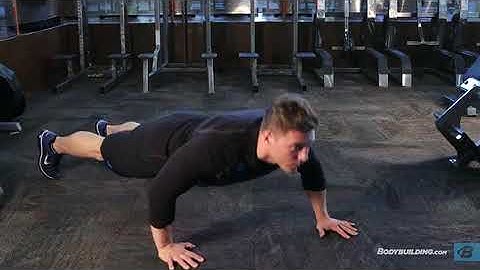 Staggered Push Up   Exercise Videos & Guides   Bodybuilding com