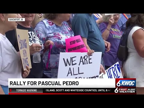 Protestors gather outside