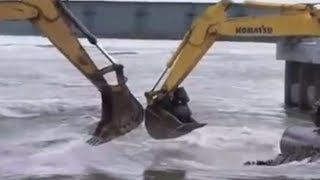 LOL: In Siberia, Russians cross the river with 2 excavators