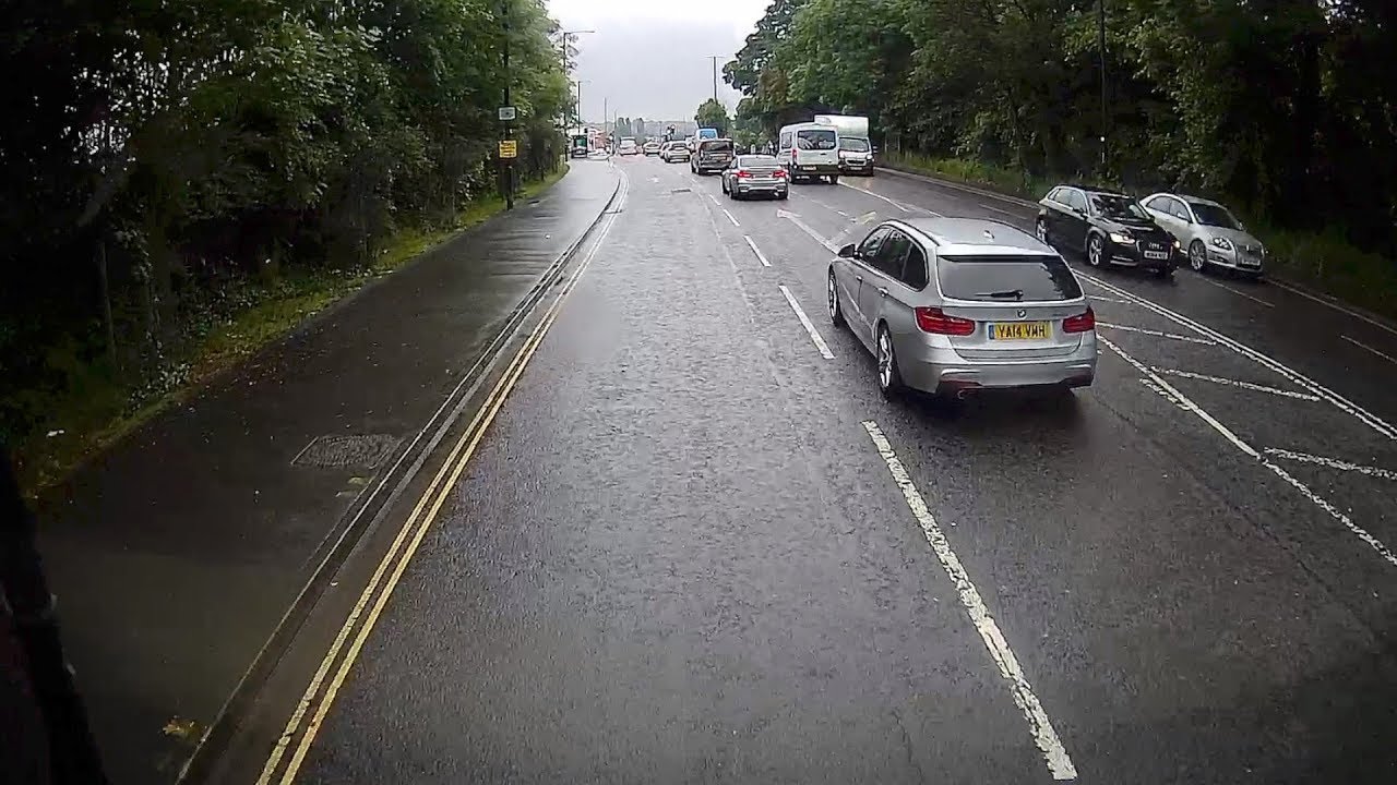 BMW and Van use bus lane to jump queue