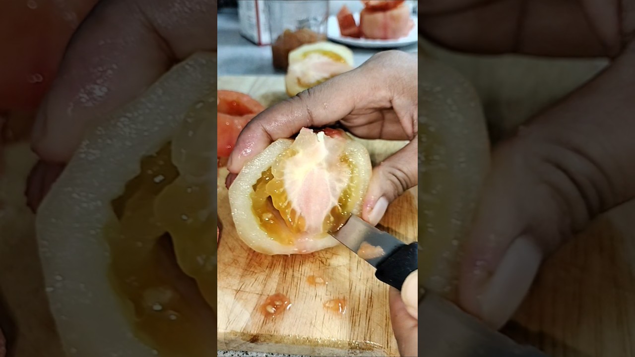 removing the seeds of unripe peeled tomato