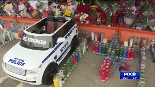 Prayer vigil held for fallen NYPD officer