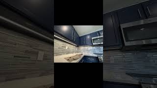 Blue Kitchen Cabinets With LED Lighting Underneath #CoeurdAlene #electrician #kitchen