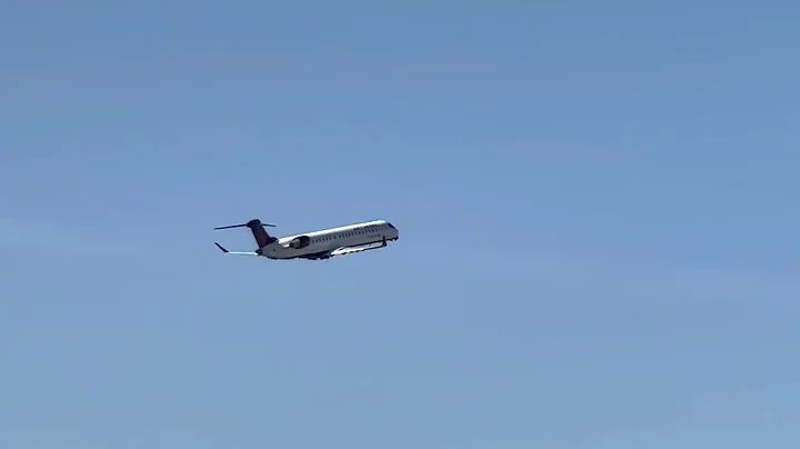 Air Canada Express (Jazz Aviation) Bombardier CRJ-900LR [C-FJZL] taking off from RDU Airport