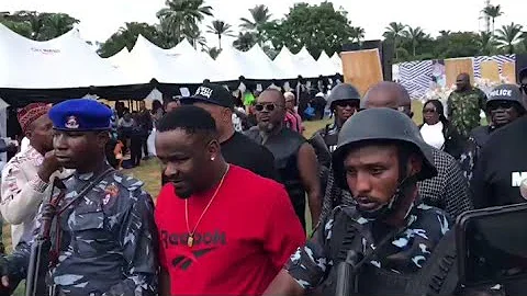 Zubby Michael with big entourage and red polo at Junior Pope Swagnation burial, is it wrong or right