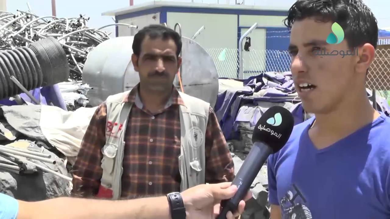 جمعية اهلنا توزع مساعدات انسانية على النازحين في مخيم ديبكة