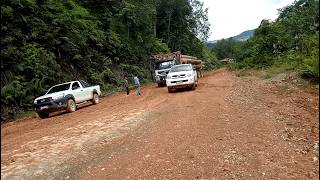 Toyota Hilux Pulling Volvo Logging Truck - 4x4 Pickup Truck and 6x6 Truck In Mud Route