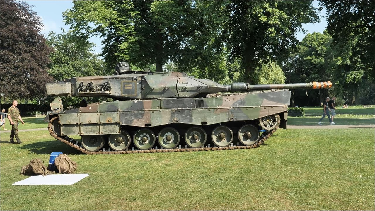 Leopard Tanks Loading on Trailers