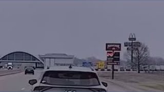 Driver asleep behind wheel forced to stop by police officer who intentionally crashes into car
