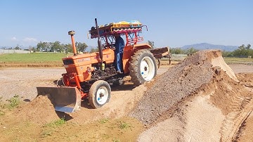 techniques for pushing and spreading soil with tracter buldozer