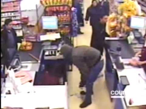 Armed robber just doesn't see it coming...