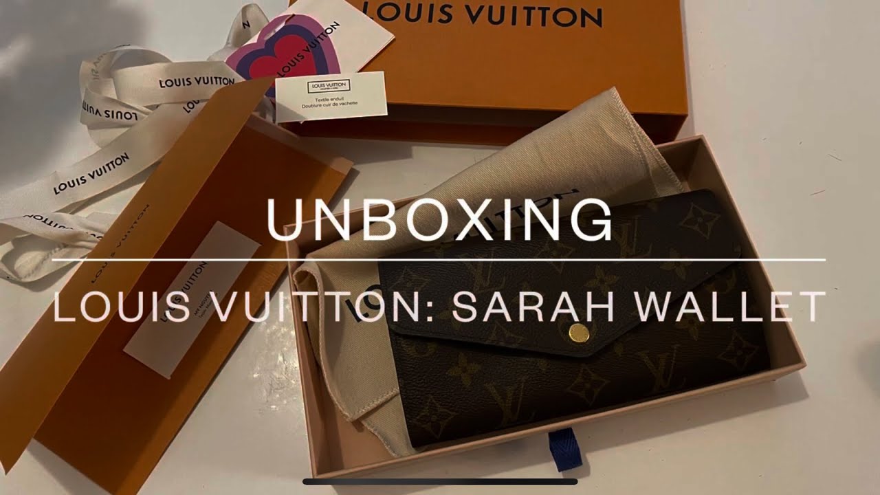 Louis Vuitton Sarah wallet with iPhone and passport inside. – Au