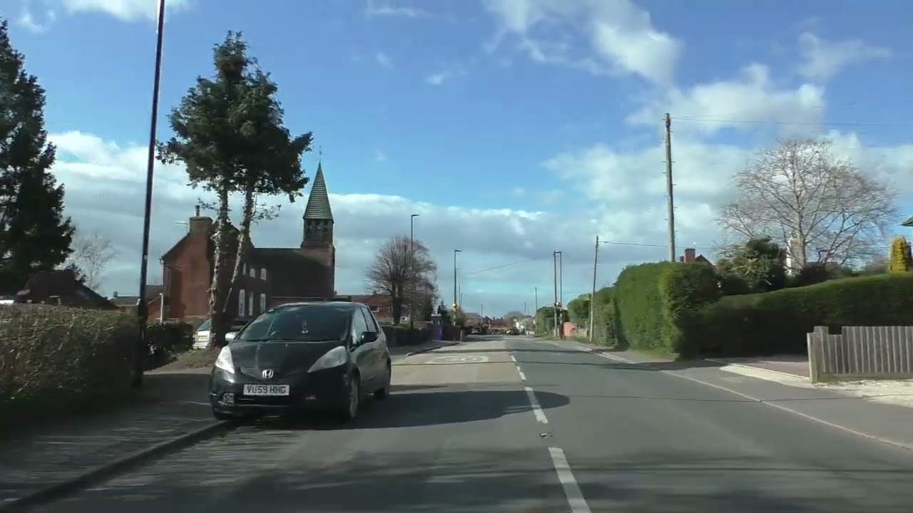 Driving On The A443 From Worcester Through Hallow To Holt Heath, Worcestershire, England
