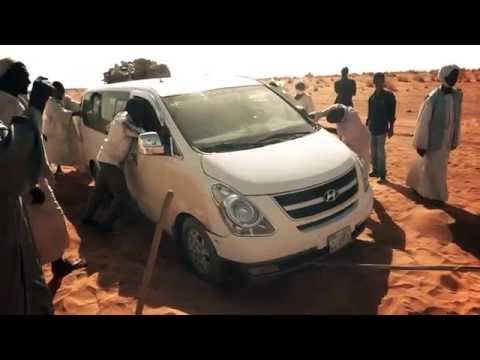 hyundai-h1-gets-sticking-in-the-sand-(captured-by:-sony-tx-10)