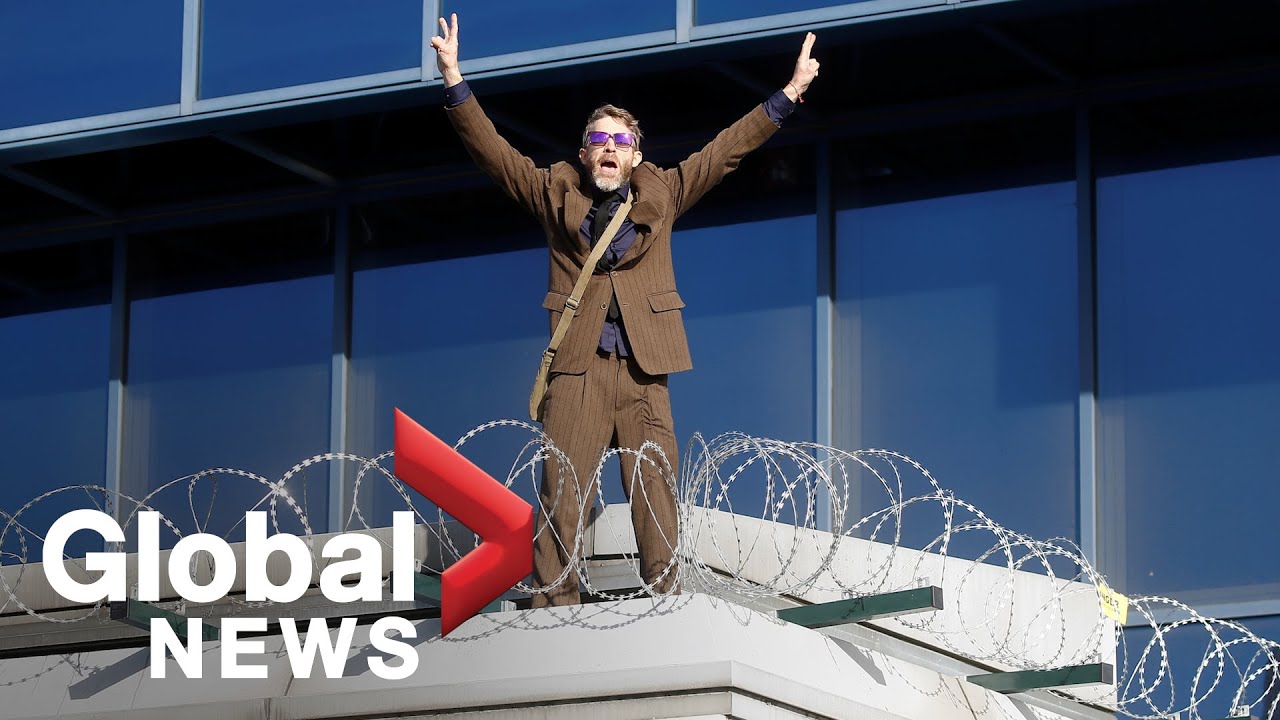 Climate protester dances on roof of London airport as Extinction Rebellion disrupts terminals trending on netflix
