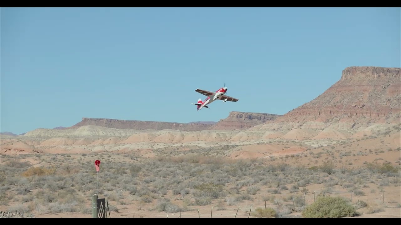 Tom Derrick flying his Extra NG