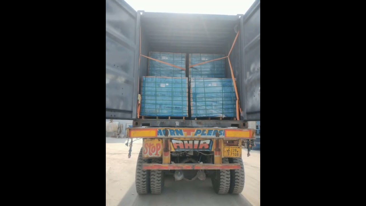 Packed with precision, built for the journey. Tile container loading — every crate counts.