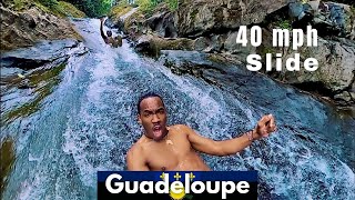 INSANE NATURAL WATER SLIDE in Guadeloupe, West Indies | La Coulisse River, French Caribbean screenshot 4