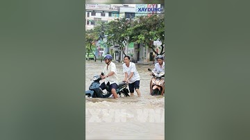 Người dân Cần Thơ “bì bõm” giữa phố khi triều cường đạt đỉnh lịch sử mới | BXD